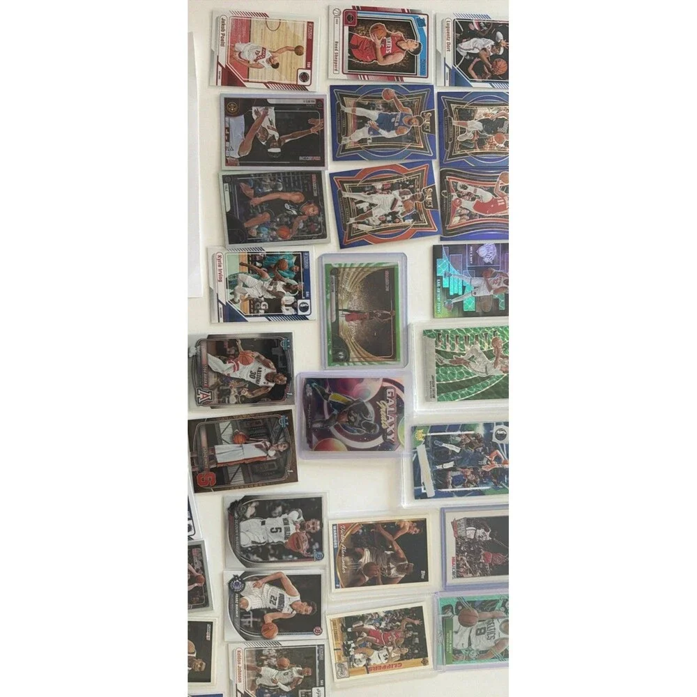 Panini 48-Card NBA 2023-24 Lot Hoops Rookies, MJ Bonus graded Luka and Tatum